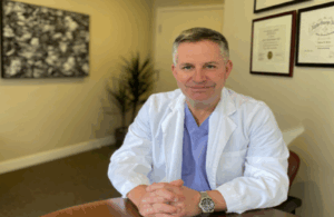 Dr Denton at his office