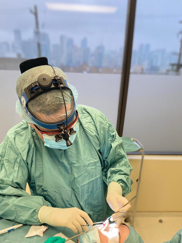 Dr. Denton performing facial surgery at his Vancouver Clinic